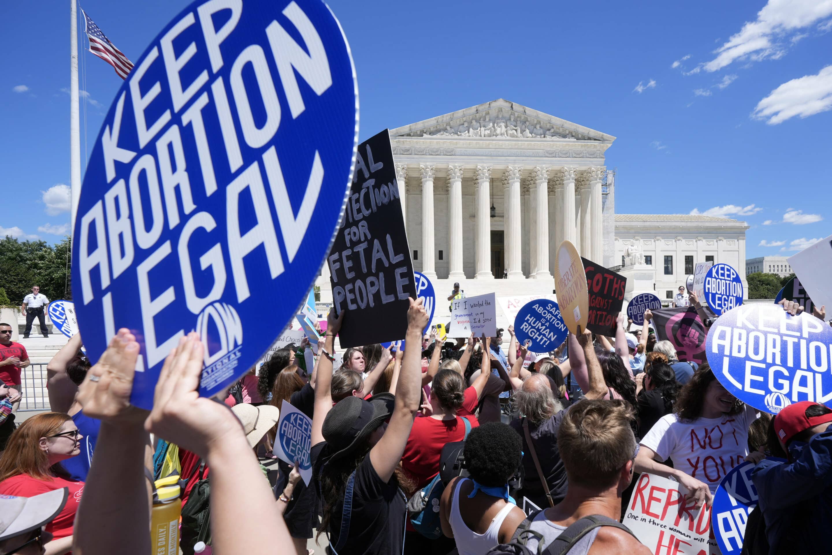 Abortion rights activists protest outside the Supreme Court, Monday, June 24, 2024, in Washington. (AP Photo/Mark Schiefelbein).