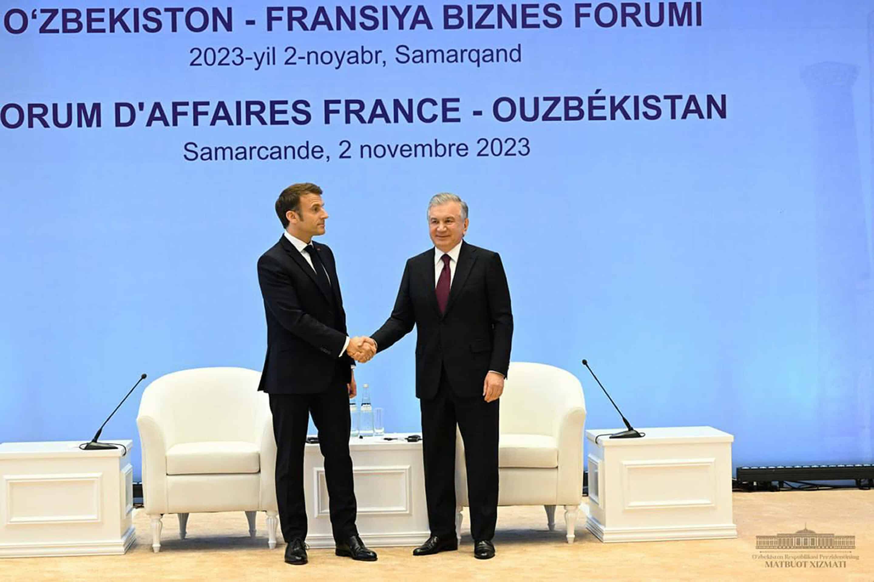 French President Emmanuel Macron shake hands as they attend a forum during their meeting in Samarkand, Uzbekistan, on Thursday, Nov. 2, 2023. MANDATORY CREDIT./2311021615